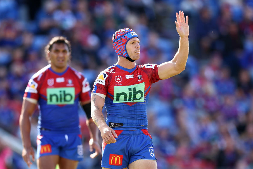 Seen here, Newcastle captain Kalyn Ponga waves at fans during an NRL game in 2022.