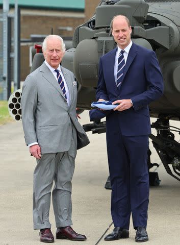 <p>Chris Jackson/Getty Images</p> Charles and Prince William at the official handover of Colonel-in-Chief of the Army air corps to the Prince of Wales in Hampshire, U.K., on May 13