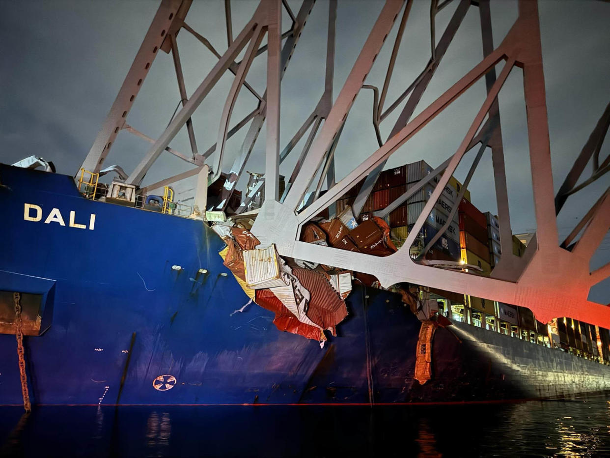 The Francis Scott Key Bridge lies in the water, following an impact from a cargo ship. (Baltimore City Fire Department / Rescue 1)