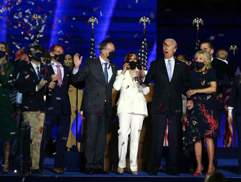 <div class="inline-image__caption"><p>Joe Biden, Jill Biden, Vice President-elect Kamala Harris and husband Doug Emhoff wave to crowd on stage after Biden's address to the nation from the Chase Center November 07, 2020 in Wilmington, Delaware.</p></div> <div class="inline-image__credit">Tasos Katopodis/Getty Images</div>