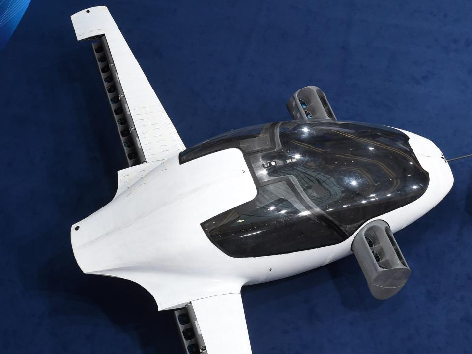 <p>A prototype of the first flying taxi, the eVTOL - electric vertical take-off and landing Jet - of the company Lilium during the trade fair Digital Summit (Digital Gipfel) in Germany, on 4 December, 2018</p> (AFP via Getty Images)