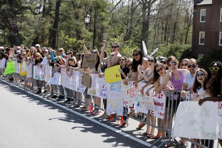 Apr 17, 2017; Boston, MA, USA; Fans hold signs and cheer on runners along the course in the 2017 Boston Marathon. Greg M. Cooper-USA TODAY Sports