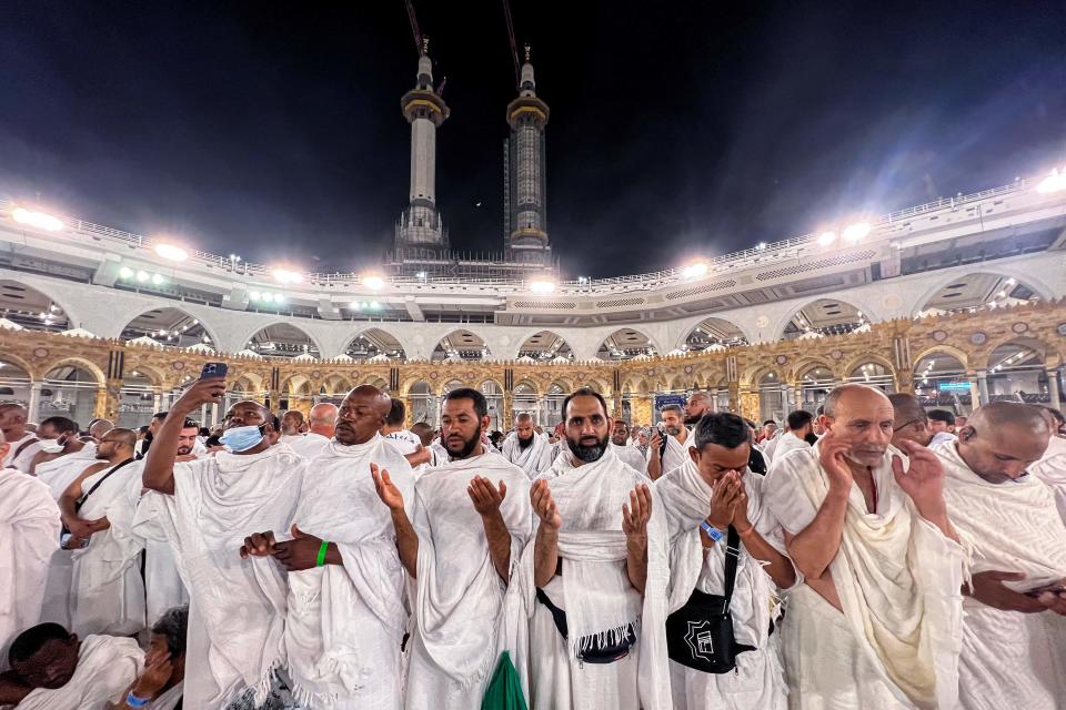 Muslim pilgrims pray at the Grand Mosque in the holy city of Mecca on June 22, 2023, as they arrive for the annual Hajj pilgrimage.