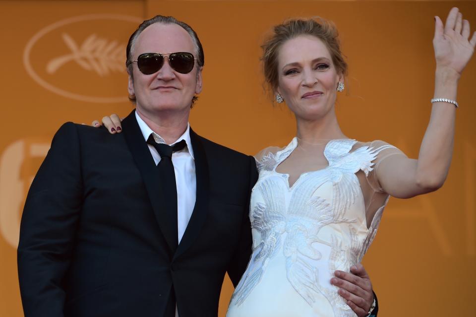 US director Quentin Tarantino and US actress Uma Thurman pose as they arrive for the Closing Ceremony of the 67th edition of the Cannes Film Festival in Cannes, southern France, on May 24, 2014.  AFP PHOTO / BERTRAND LANGLOIS        (Photo credit should read BERTRAND LANGLOIS/AFP/Getty Images)