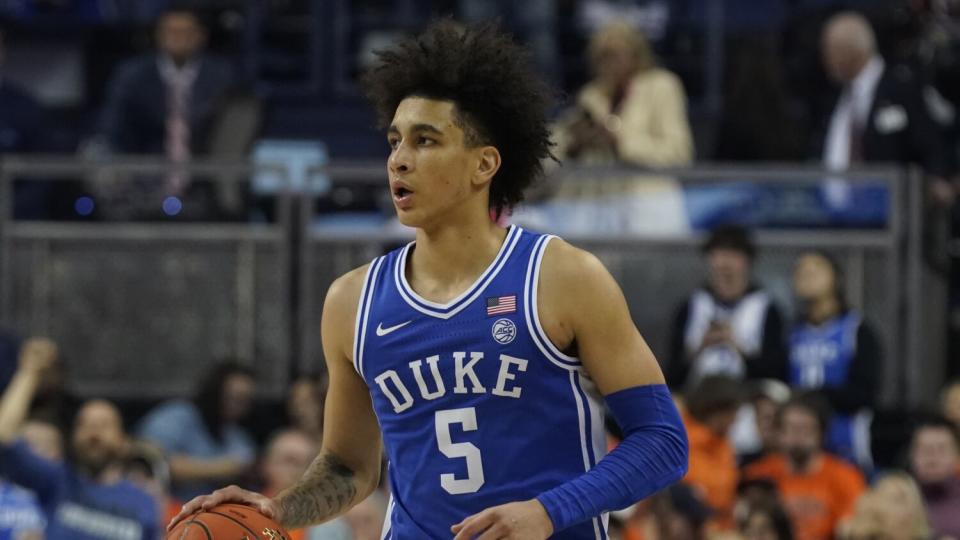 Duke guard Tyrese Proctor brings the ball up court against Virginia.