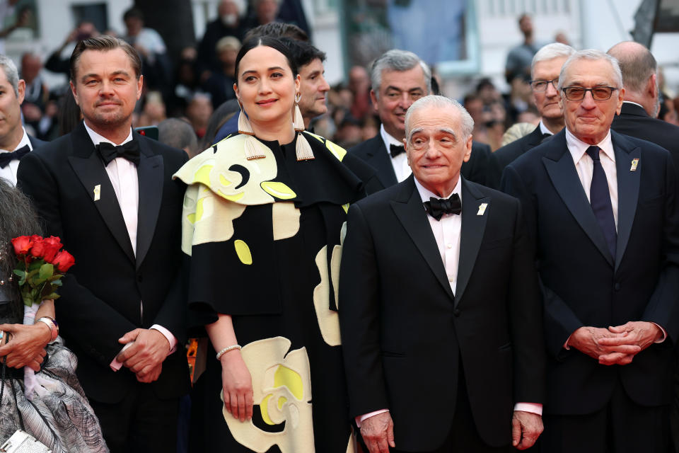 (L to R) Leonardo DiCaprio, Lily Gladstone, Martin Scorsese and Robert De Niro on the red carpet in Cannes