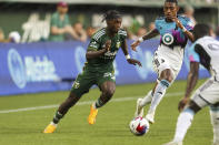 Portland Timbers midfielder Santiago Moreno runs with the ball against Minnesota United during an MLS soccer match at Providence Park in Portland, Ore. on Saturday, May 20, 2023. (Vickie Connor/The Oregonian via AP)