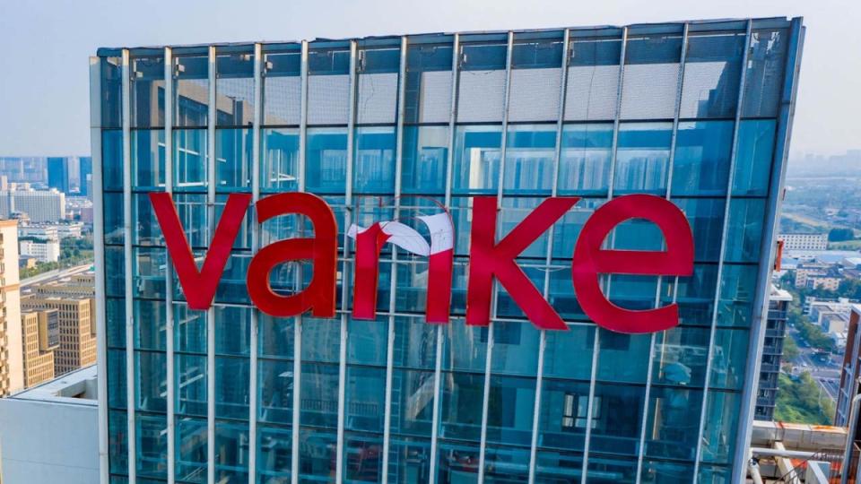 This aerial photograph taken on August 30, 2023 shows a damaged logo of Chinese real estate developer Vanke at a residential housing complex in Zhengzhou, in China's central Henan province. (Photo by AFP) (Photo by -/AFP via Getty Images)