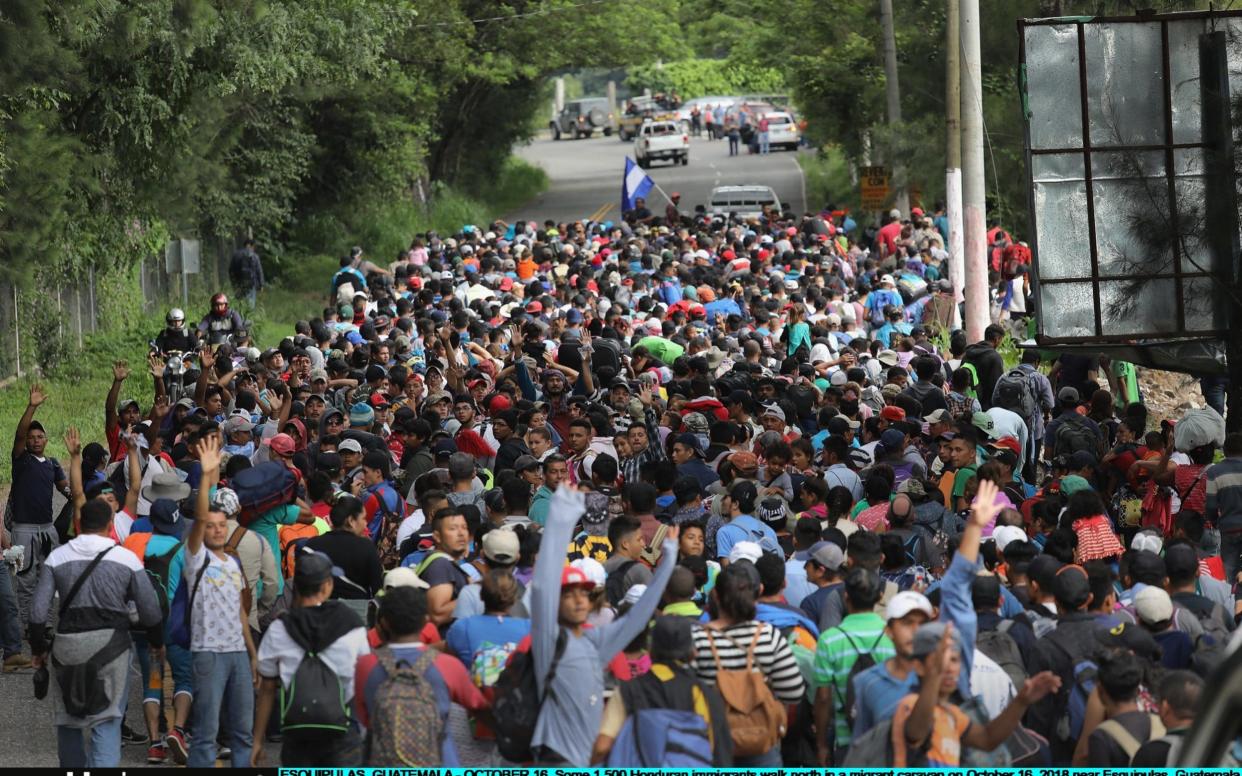 The caravan, which set off from Honduras on Saturday, crossed into Guatemala on Monday evening after a standoff with riot police - Getty Images South America