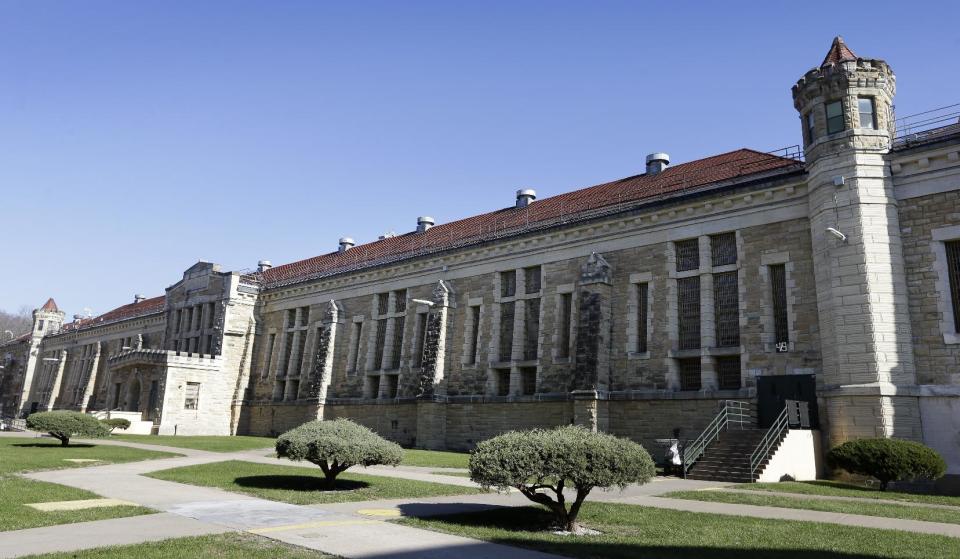 This Monday, Nov. 18, 2013, photo shows a cell block from inside the yard at the Iowa State Penitentiary in Fort Madison, Iowa. The penitentiary, the oldest in use west of the Mississippi River with a history dating back to 1839, is set to close when a $130 million replacement opens down the road next year. City and state officials are discussing how to make the best use of the sprawling and occasionally crumbling prison campus that has been the site of escapes, riots and executions. (AP Photo/Charlie Neibergall)