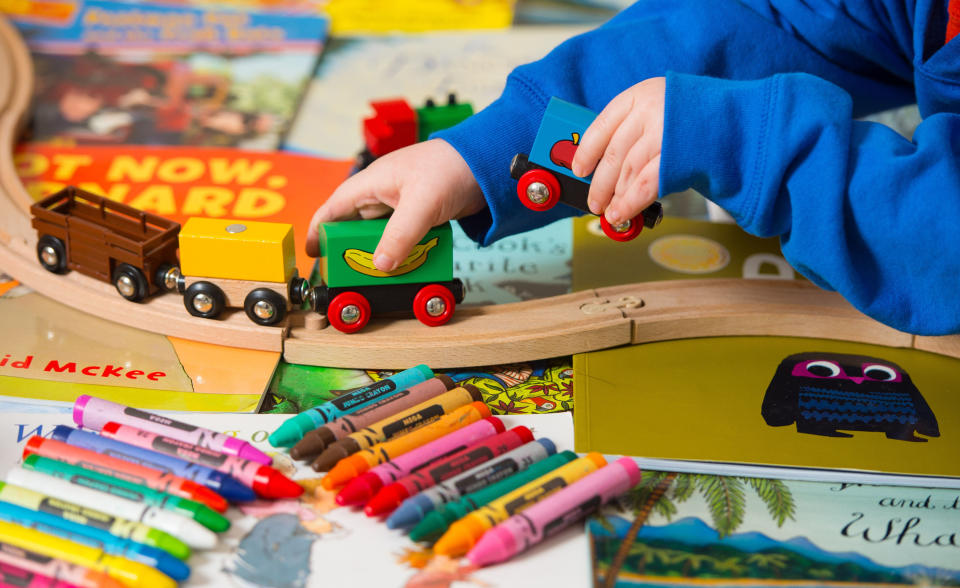 A child is seen playing with toys. Source: AAP