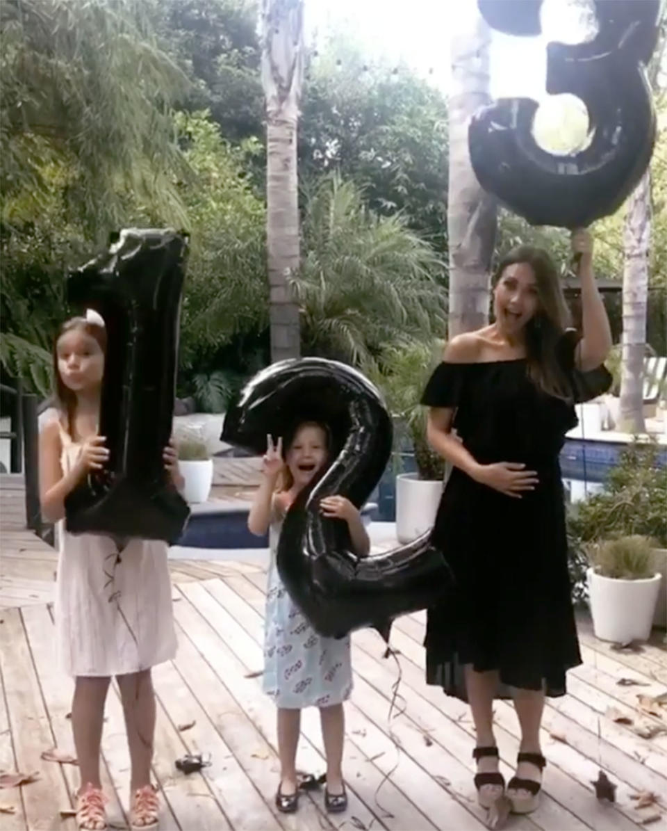 <p>For her July <span>pregnancy announcement</span> — the actress and husband Cash Warren are <span>expecting their third child</span> — Jessica Alba poses alongside daughters <span>Haven Garner</span>, 6, and <span>Honor Marie</span>, 9, in McGuire's <span>The Wild Years Off the Shoulder Dress</span> ($215). <strong>Finish the Look!</strong> Women's Strappy Slingback Platform Wedge Sandals ($17 to $31), <span>amazon.com</span></p>