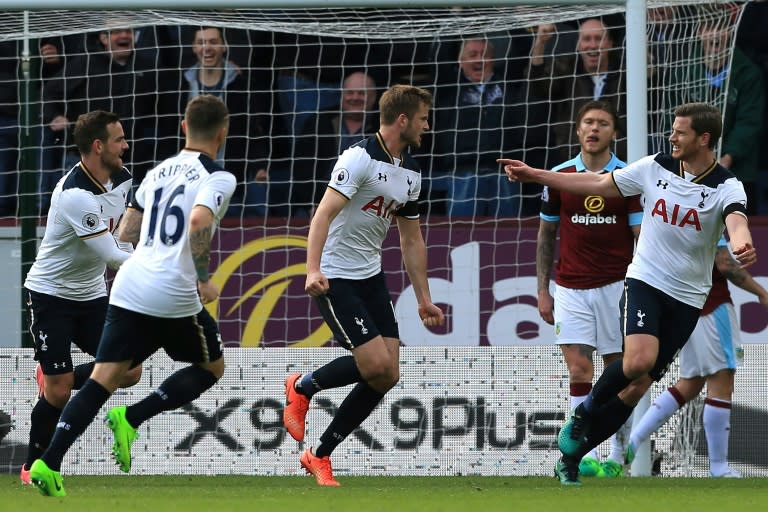 Tottenham Hotspur's Eric Dier (C) celebrates with teammates after scoring the opening goal against Burnley on April 1, 2017