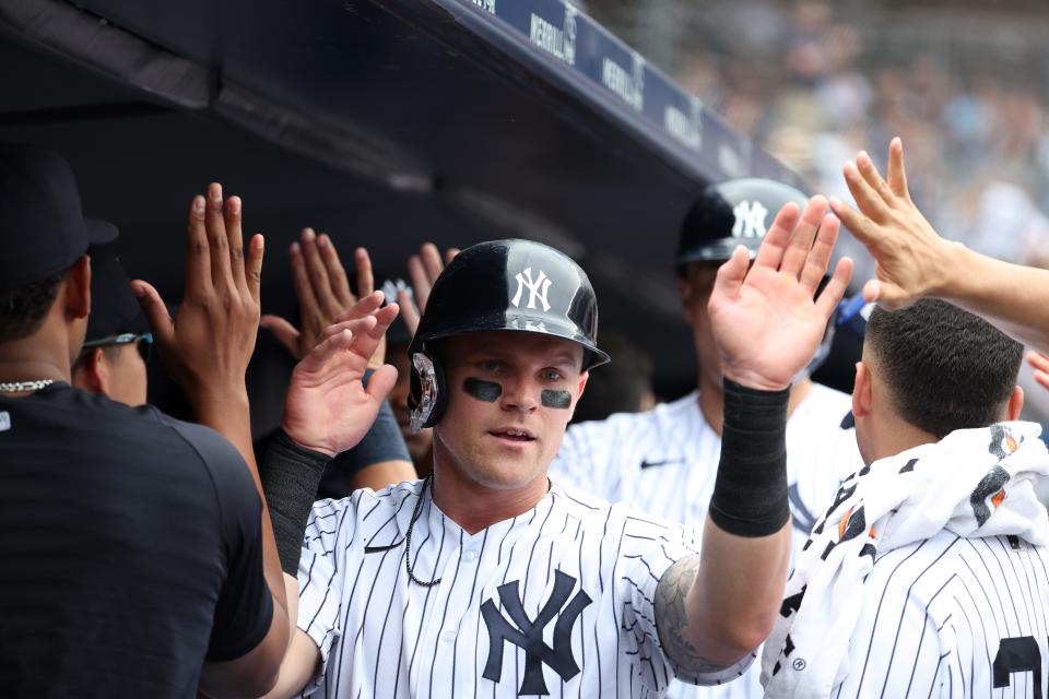 Jake Bauers celebrates after scoring a run during a game with the New York Yankees at Yankee Stadium on June 25, 2023.