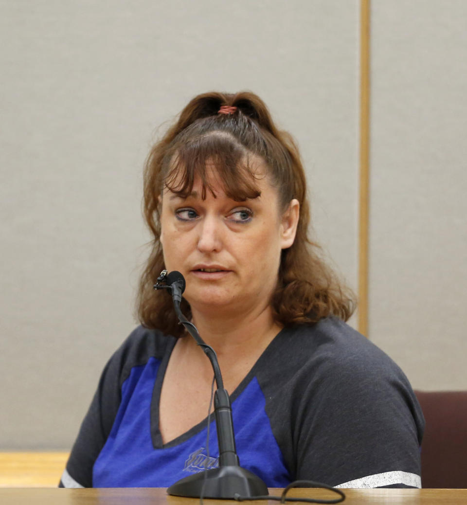 Wendi Oliver, Roy Oliver's half sister, testifies against defendant Roy Oliver, who was convicted for the murder of 15-year-old Jordan Edwards, during the sentencing phase at the Frank Crowley Courts Building in Dallas on Wednesday, Aug. 29, 2018. Wendi Oliver testified against Roy Oliver, saying she felt compelled after listening to testimony and that she hoped he "gets what he deserves." (Rose Baca/The Dallas Morning News via AP, Pool)