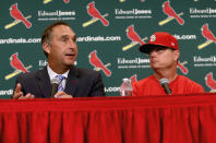 FILE - St. Louis Cardinals President of Baseball Operations John Mozeliak, left, answers questions after the team announced Mike Shildt, right, as manager, at Busch Stadium in St. Louis.,in this Tuesday, Aug. 28, 2018, file photo. The Cardinals fired former National League manager of the year Mike Shildt over organizational differences Thursday, Oct. 14, 2021, just one week after St. Louis lost to the Los Angeles Dodgers on a walk-off homer in the wild-card game. Mozeliak said the firing was “something that popped up recently,” but he refused to expand on what he called “philosophical differences” between Shildt, the coaching staff and the front office. (Christian Gooden/St. Louis Post-Dispatch via AP, File)