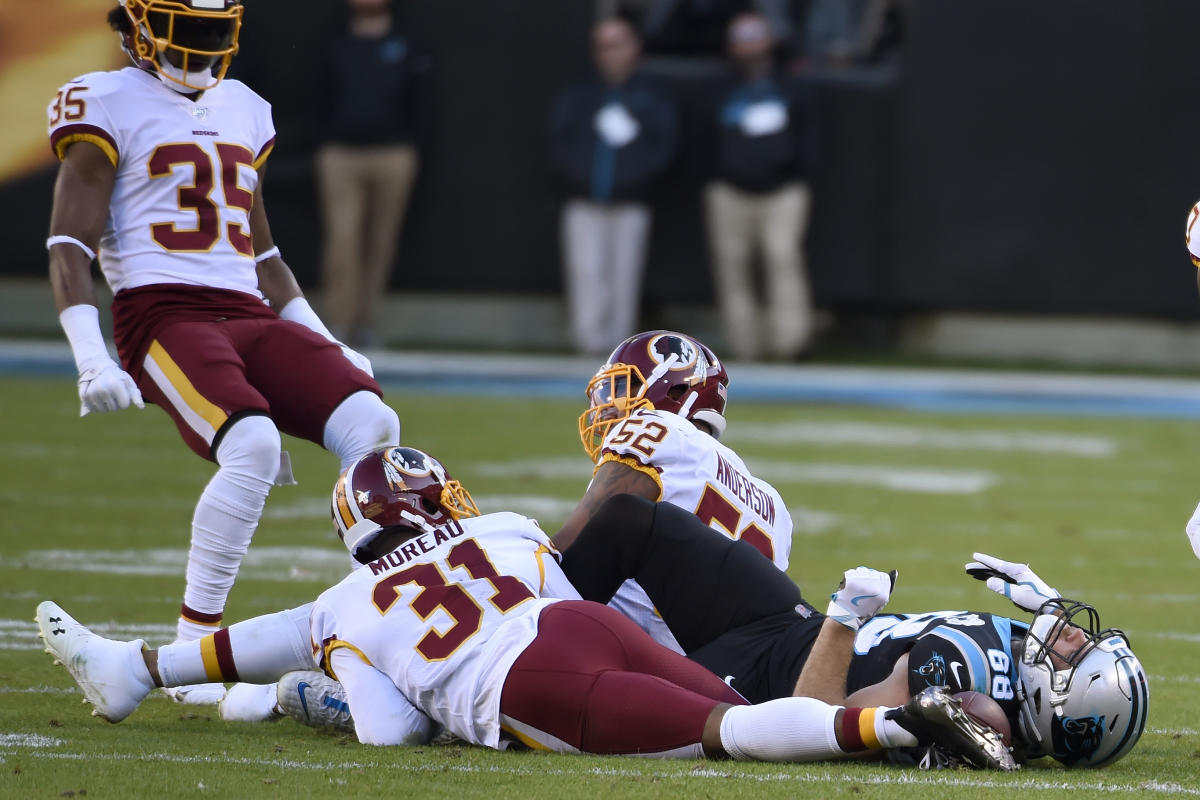 Greg Olsen of the Carolina Panthers runs with the ball in the second