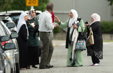 Members of a family react outside the mosque following a shooting at the Al Noor mosque in Christchurch, New Zealand, March 15, 2019. REUTERS/SNPA/Martin Hunter