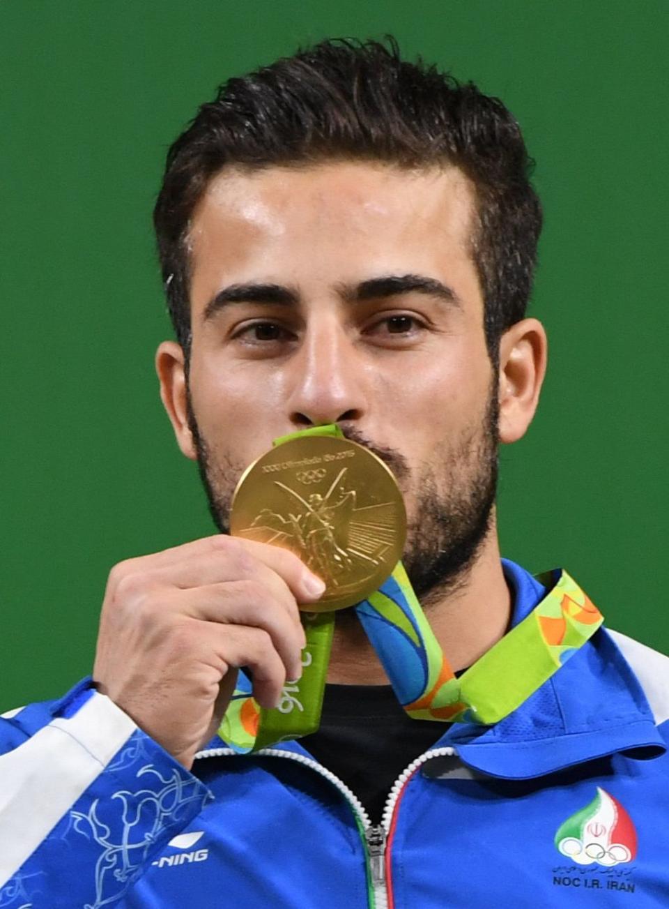 Iranian weightlifter Kianoush Rostami&nbsp;won gold at the Summer Olympics in Rio last year. (Photo: GOH CHAI HIN via Getty Images)