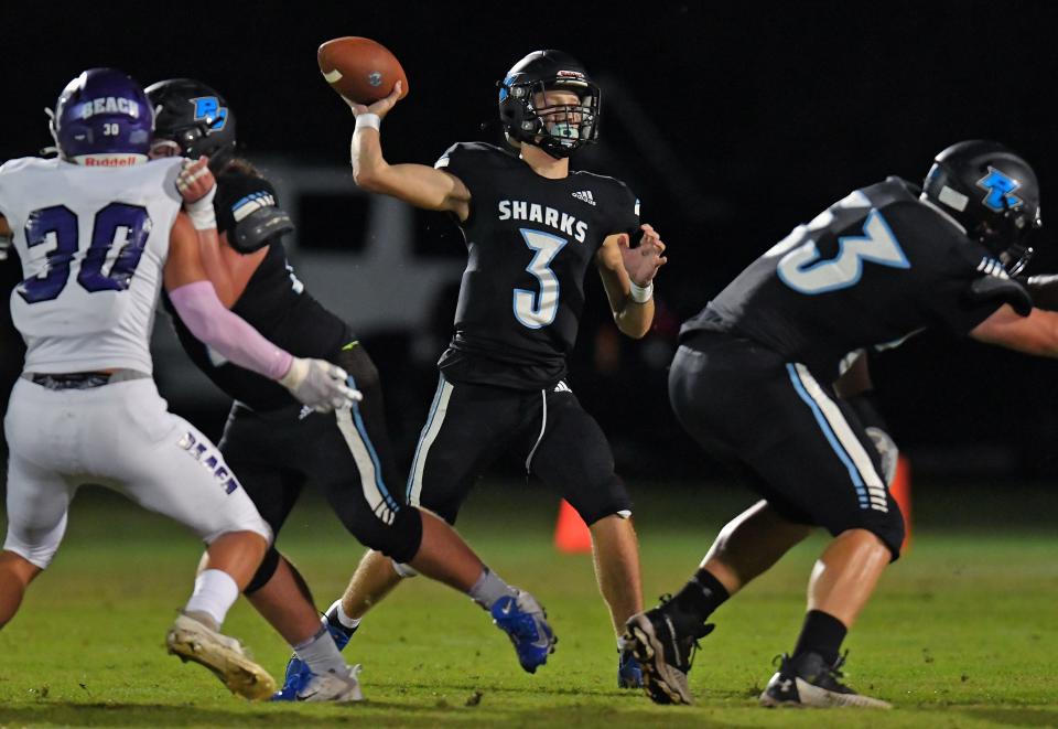 Sharks quarterback (3) Nathan Bunkoski targets a receiver during first quarter action. The Ponte Vedra Shark football team hosted the Fletcher Senators Friday night, October 29, 2021.