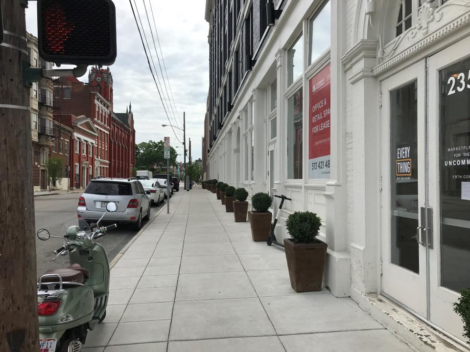 Looking east along 12th Street in Over-The-Rhine in front of Everything But The House's new headquarters. The Cincinnati Shakespeare Co. and Washington Park are at the end of the block.