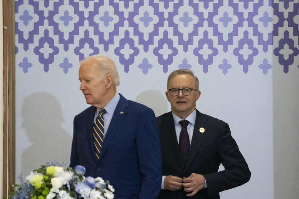 U.S. President Joe Biden, left, walks with Australian Prime Minister Anthony Albanese into a meeting during the Association of Southeast Asian Nations (ASEAN) summit, Sunday, Nov. 13, 2022, in Phnom Penh, Cambodia. (AP Photo/Alex Brandon)