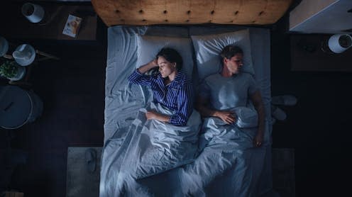 <span class="caption">Our review identified key differences in sleep quality and circadian rhythm function between men and women.</span> <span class="attribution"><a class="link " href="https://www.shutterstock.com/image-photo/top-view-apartment-happy-young-couple-2229882491" rel="nofollow noopener" target="_blank" data-ylk="slk:Gorodenkoff/ Shutterstock;elm:context_link;itc:0;sec:content-canvas">Gorodenkoff/ Shutterstock</a></span>