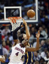 Atlanta Hawks forward Paul Millsap, foreground, and Indiana Pacers forward Luis Scola battle for a jump ball in the first half of Game 3 of an NBA basketball first-round playoff series on Thursday, April 24, 2014, in Atlanta. (AP Photo/John Bazemore)