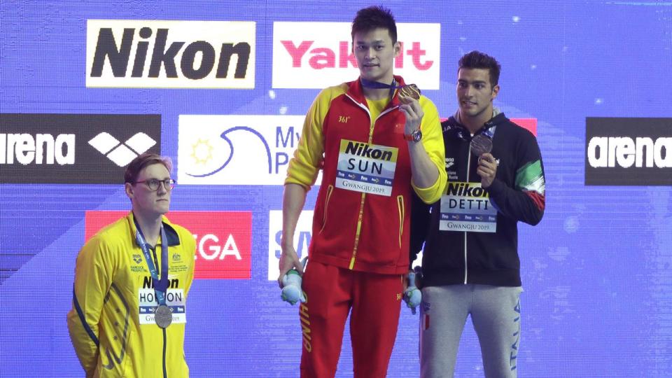 Sun Yang on the podium at the 2019 World Swimming Championships.