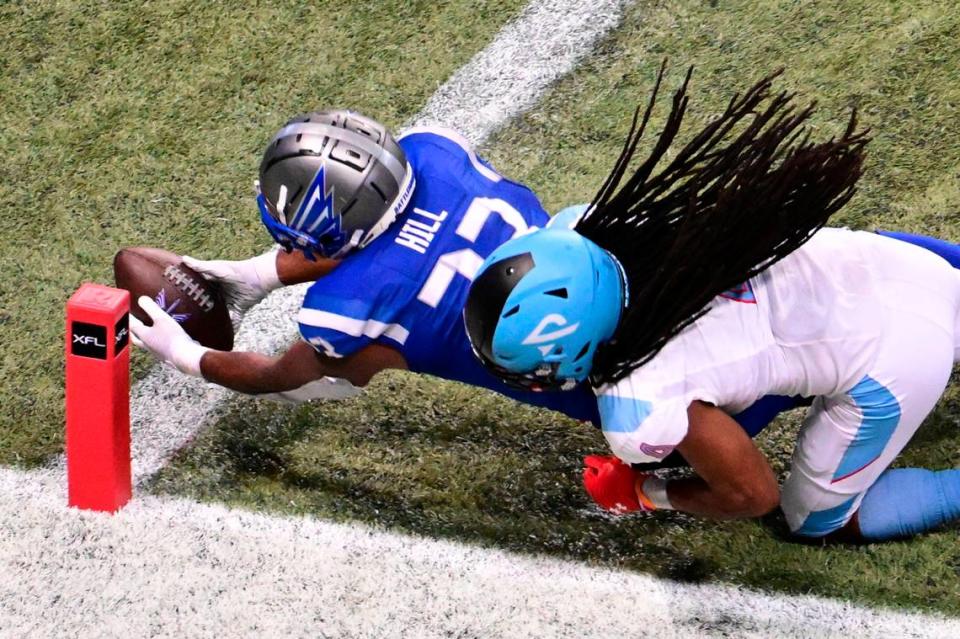 Belleville West graduate Brian Hill dives for a touchdown during the St. Louis Battlehawks’ game Sunday against the Arlington (Texas) Defenders. Hill rushed for a team-leading 89 yards on just 18 carries and caught two passes for 26 more yards in helping lead the Battlehawks to a 24-11 victory at the Dome at America’s Center.