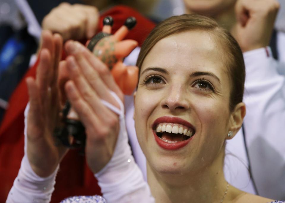 Carolina Kostner of Italy reacts in the "kiss and cry" area during the Team Ladies Short Program at the Sochi 2014 Winter Olympics, February 8, 2014. REUTERS/Darron Cummings/Pool (RUSSIA - Tags: SPORT FIGURE SKATING SPORT OLYMPICS)