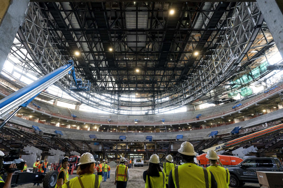 Members of the media tour the Los Angeles Clippers' Intuit Dome in Inglewood, Calif., Thursday, June 22, 2023. The arena is expected to be completed in time for the 2024-25 NBA season. (AP Photo/Jae C. Hong)
