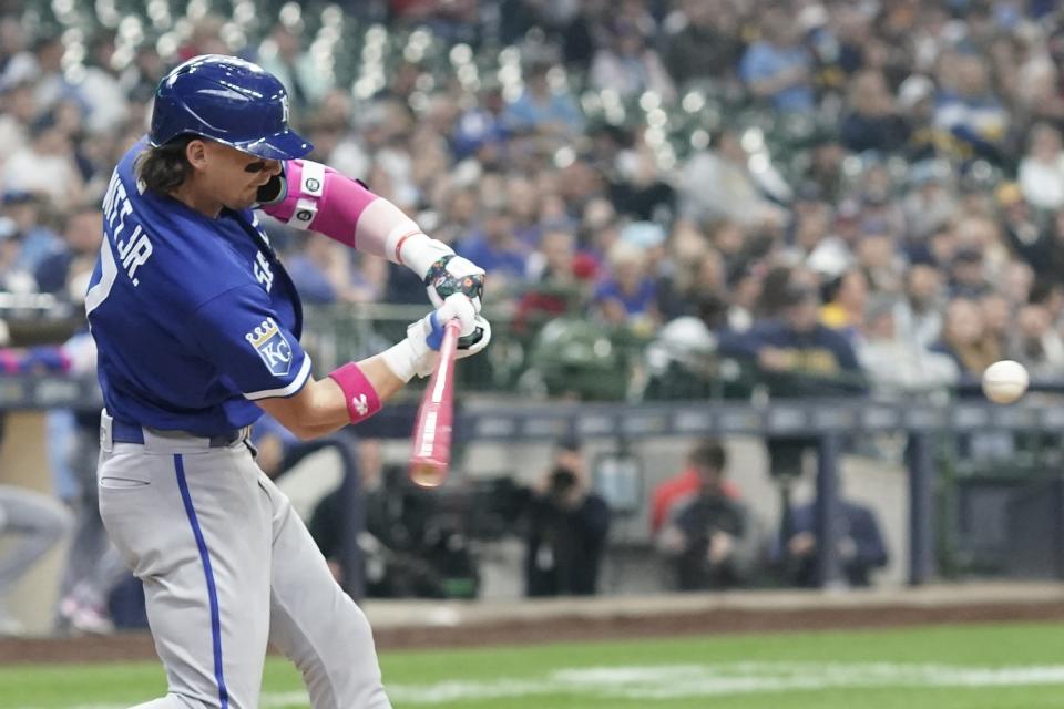 Kansas City Royals' Bobby Witt Jr. hits a two-run scoring double during the second inning of a baseball game against the Milwaukee Brewers Sunday, May 14, 2023, in Milwaukee. (AP Photo/Morry Gash)