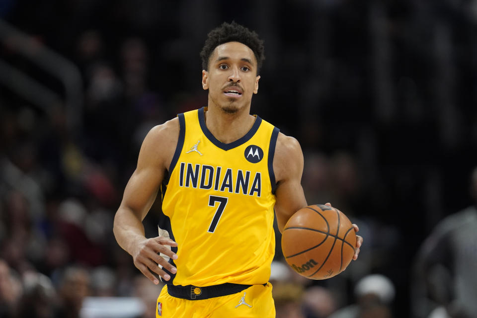 FILE - Indiana Pacers guard Malcolm Brogdon plays against the Detroit Pistons in the second half of an NBA basketball game in Detroit, on March 4, 2022. The Boston Celtics improved its backcourt depth Friday, July 1, 2022, by acquiring combo guard Malcolm Brogdon in a trade with the Indiana Pacers, a person familiar with the deal told The Associated Press. (AP Photo/Paul Sancya, File)