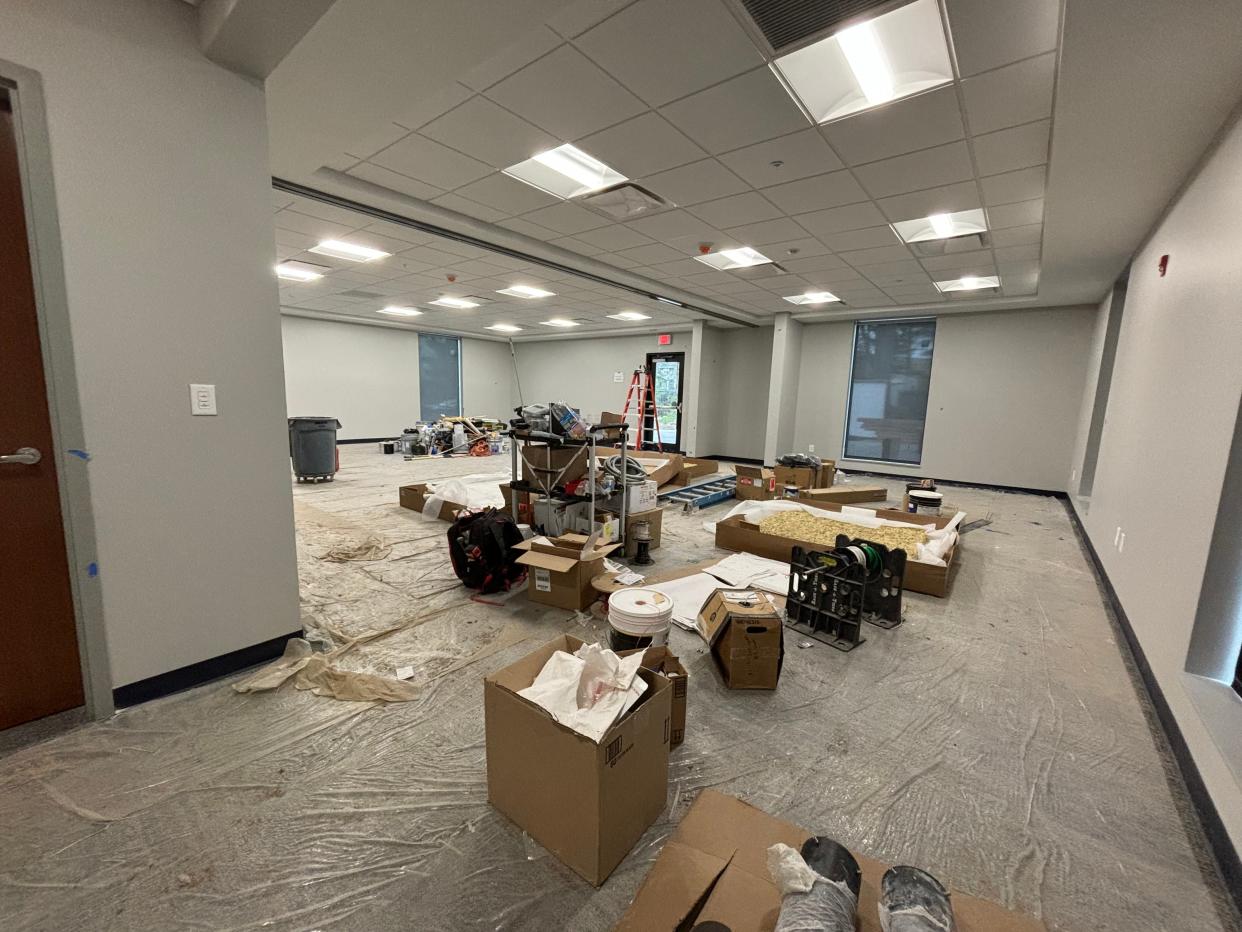 Building supplies and equipment covers the floor of a room inside the Center for Teen Empowerment’s new building set to open in June.