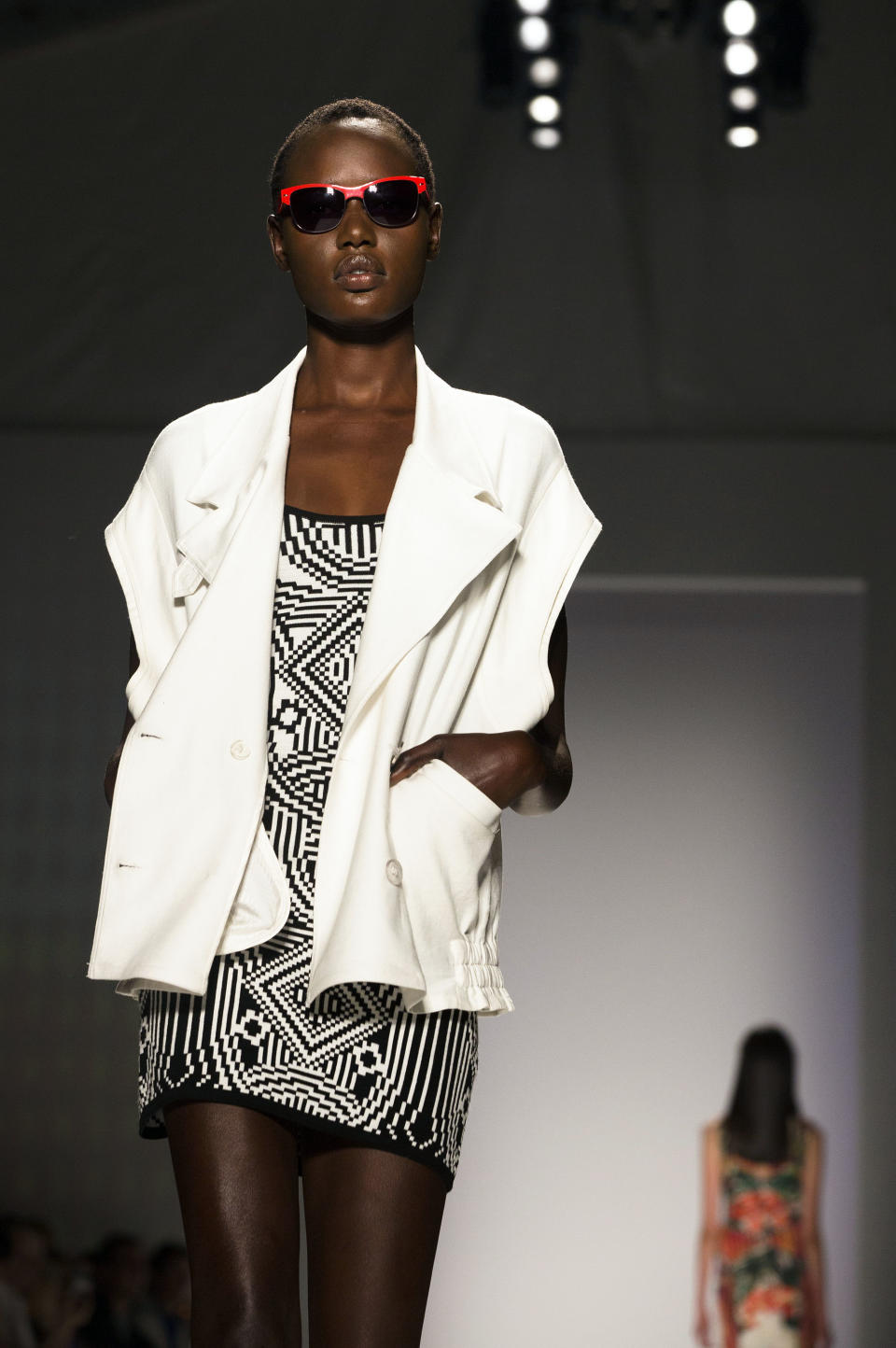 The Nicole Miller Spring 2013 collection is modeled during Fashion Week in New York, Friday, Sept. 7, 2012. (AP Photo/John Minchillo)