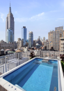 <p>There’s also a pool. (Douglas Elliman) </p>