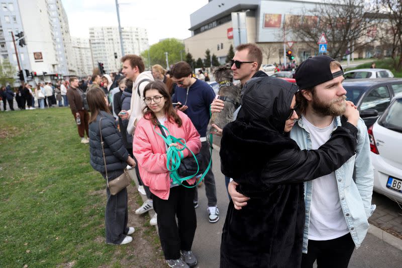 Russian citizens stand in long lines to vote on the last day of the presidential elections