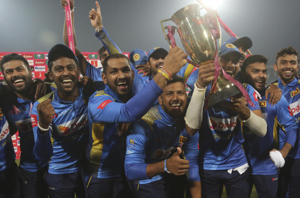 Sri Lankan players celebrate their victory against Pakistan in the final of Twenty20 at the Gaddafi Stadium in Lahore, Pakistan, Wednesday, Oct. 9, 2019. A second-string Sri Lanka team whitewashed top-ranked Pakistan 3-0 by registering 13-run victory in the third and final Twenty20 on Wednesday. (AP Photo/K.M. Chaudary)