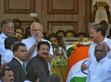 Prime Minister Narendra Modi gestures after paying homage to the body of Jayalalithaa Jayaram, a powerful politician who died on Monday, in Chennai, India December 6, 2016. REUTERS/Stringer