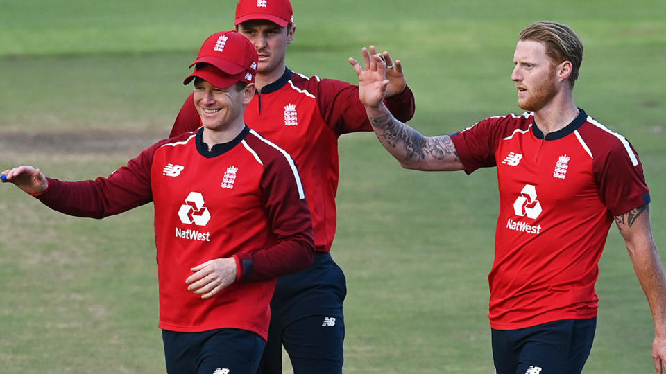 Eoin Morgan and England teammates, pictured here celebrating a wicket against South Africa.