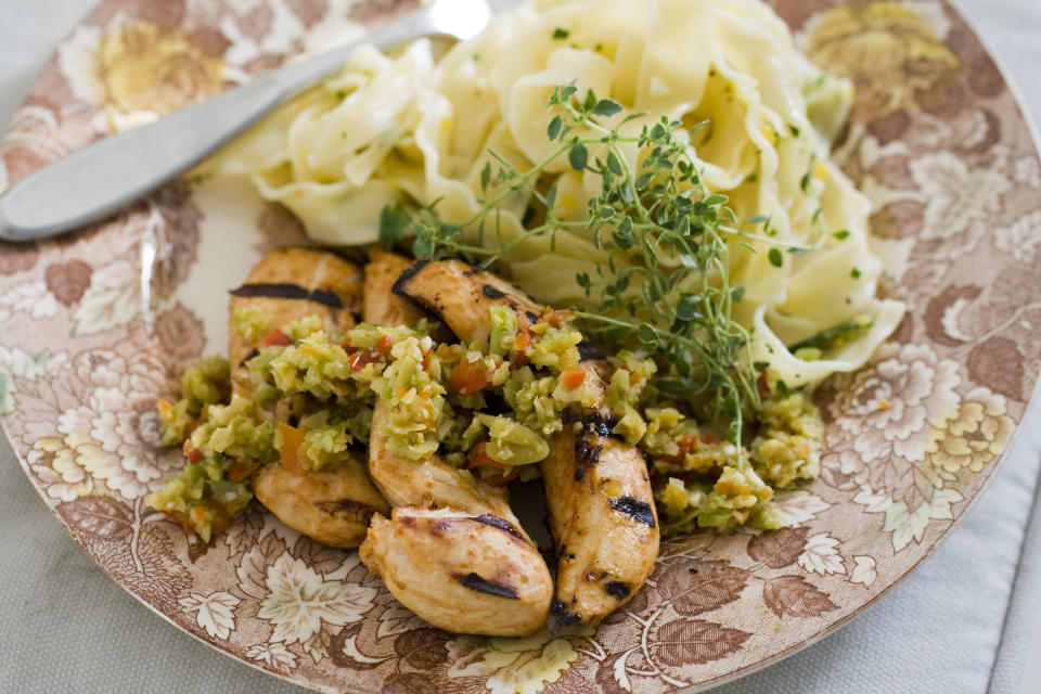 This Sept. 23, 2013 photo shows bloody mary chicken with olive-celery tapenade in Concord, N.H. (AP Photo/Matthew Mead)