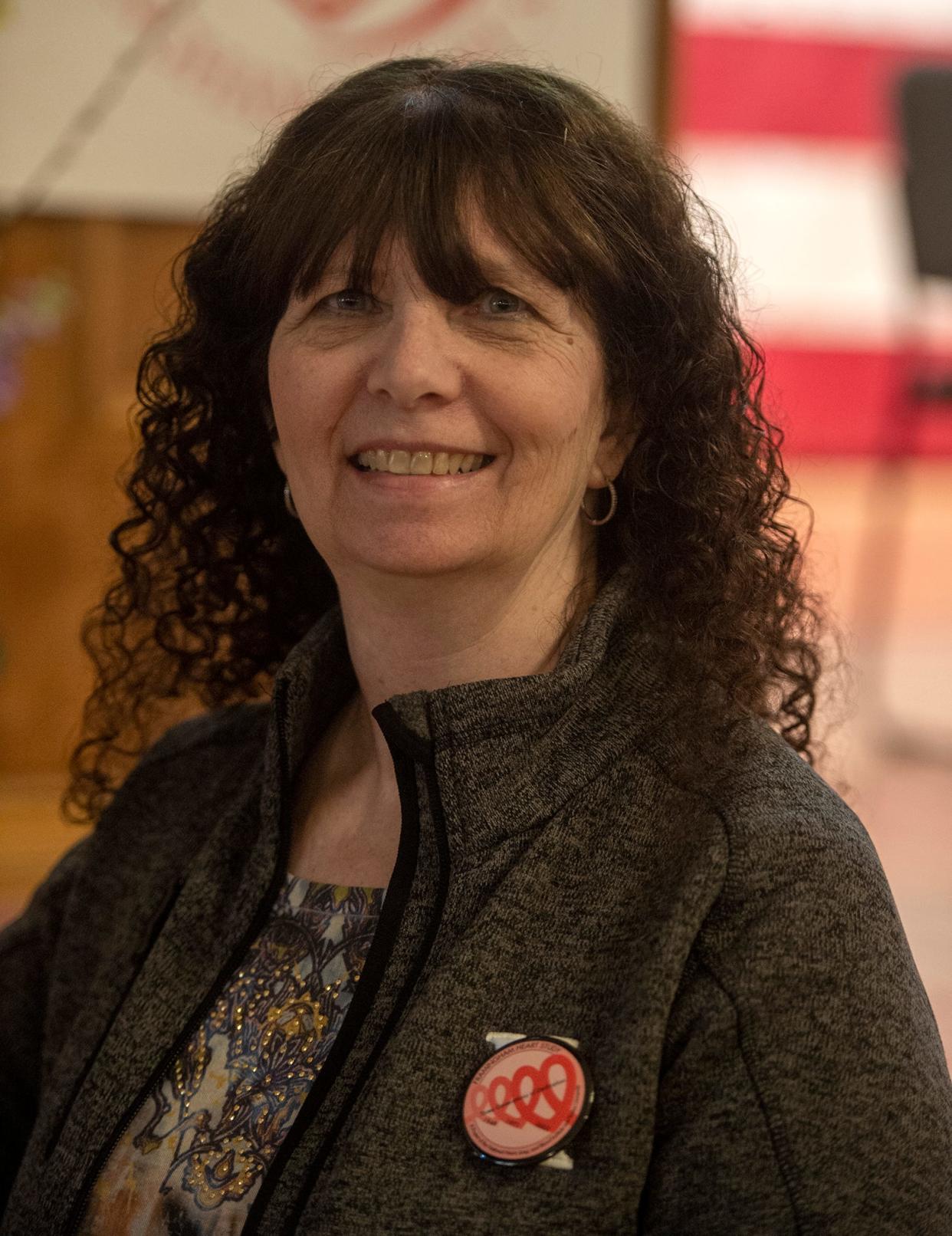 Judy Daubney, of Upton, formerly of Framingham, is a participant in the Framingham Heart Study, here at the 75th anniversary celebration at Nevins Hall in the Framingham Memorial Building, April 8, 2024.