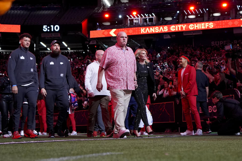 Kansas City Chiefs head coach Andy Reid, quarterback Patrick Mahomes and tight end Travis Kelce arrive for the NFL football Super Bowl 58 opening night Monday, Feb. 5, 2024, in Las Vegas. The San Francisco 49ers face the Kansas City Chiefs in Super Bowl 58 on Sunday. (AP Photo/Matt York)