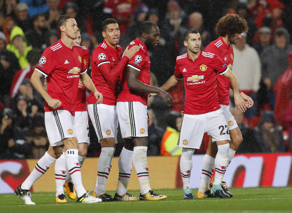 Manchester United’s Romelu Lukaku celebrates his goal with his teammates during the Champions League group A soccer match between Manchester United and Basel (AP Photo/Frank Augstein)