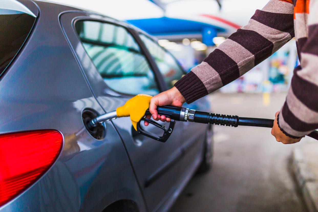 Man refueling the car at gas station