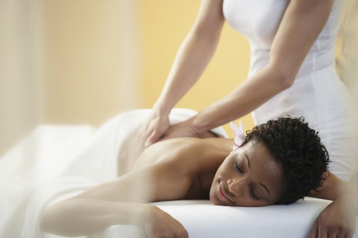 african woman receiving massage