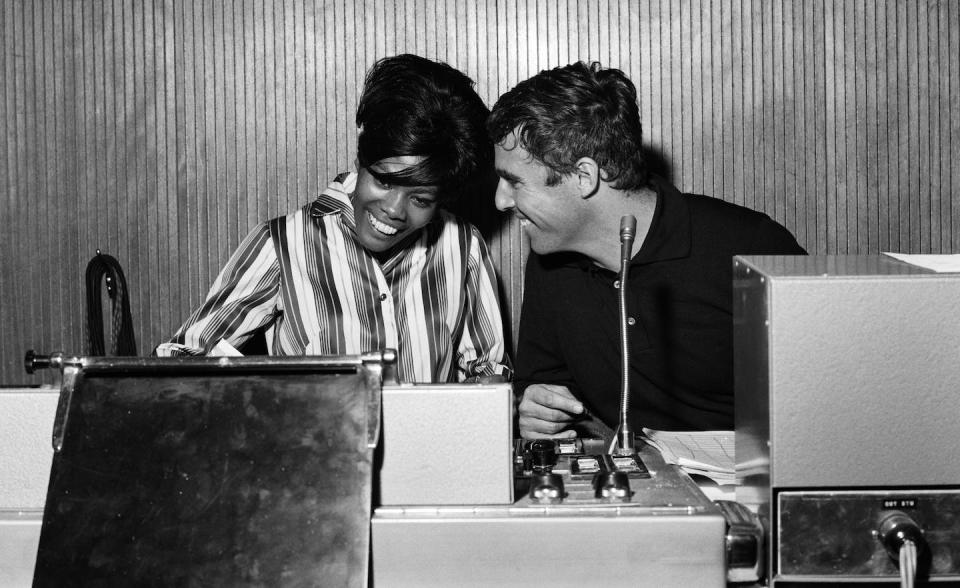 Burt Bacharach and Dionne Warwick recording together in 1964. <a href="https://www.gettyimages.com/detail/news-photo/burt-bacharach-and-dionne-warwick-recording-a-song-at-the-news-photo/912534356?phrase=burt%20bacharach%20warwick&adppopup=true" rel="nofollow noopener" target="_blank" data-ylk="slk:Bela Zola/Mirrorpix/Getty Images;elm:context_link;itc:0;sec:content-canvas" class="link ">Bela Zola/Mirrorpix/Getty Images</a>