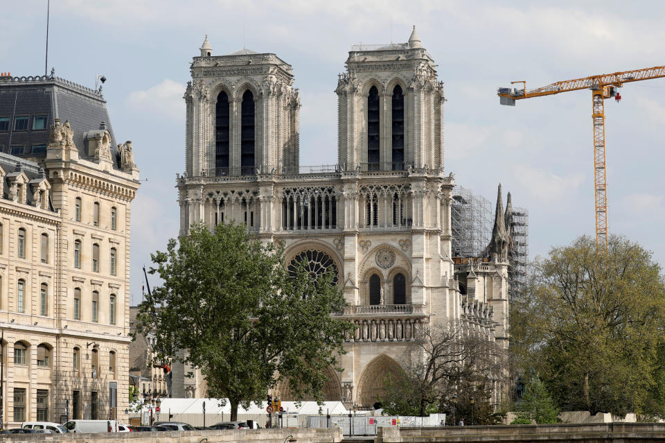 A view shows the Notre-Dame de Paris Cathedral, which was damaged in a devastating fire one year ago, as the coronavirus disease (COVID-19) lockdown slows down its restoration in Paris, France, April 11, 2020. (REUTERS/Charles Platiau)