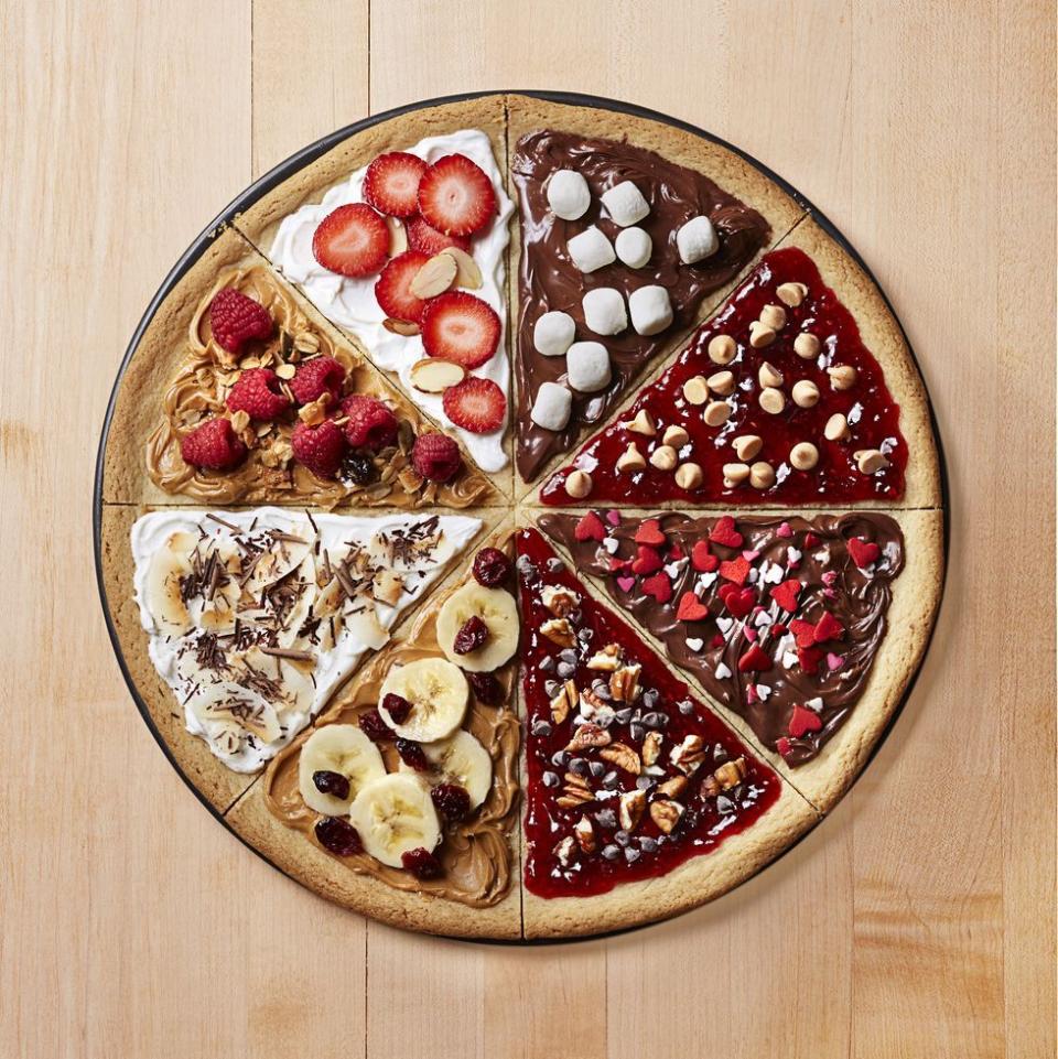 <p>Make it a pizza (cookie) party! Bake one giant <a href="https://www.goodhousekeeping.com/food-recipes/a28566839/basic-sugar-cookies-recipe/" rel="nofollow noopener" target="_blank" data-ylk="slk:sugar cookie;elm:context_link;itc:0;sec:content-canvas" class="link ">sugar cookie</a>, cut it into 8 wedges and let everyone decorate their own piece.</p><p><em><a href="https://www.goodhousekeeping.com/food-recipes/a12590/cookie-pizza-recipe-ghk0215/" rel="nofollow noopener" target="_blank" data-ylk="slk:Get the recipe for Cookie "Pizza"»;elm:context_link;itc:0;sec:content-canvas" class="link ">Get the recipe for Cookie "Pizza"»</a></em></p>